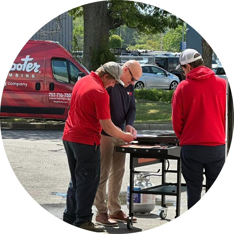 Mr.-Rooter-Plumbing-of-Northern-Virginia-Mr.-Poole-firing-up-the-grill-cooking-breakfast-for-the-team-4122