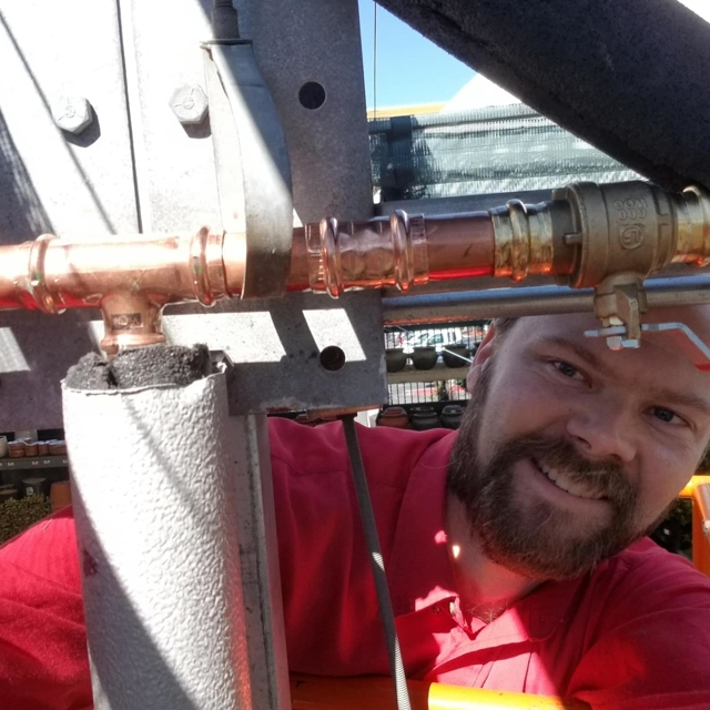 Mr. Rooter employee Lance fixing pipe