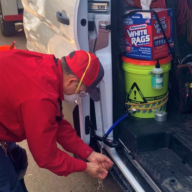 Technician washing hands