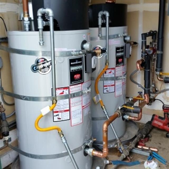 Two 80 gallon commercial water heaters