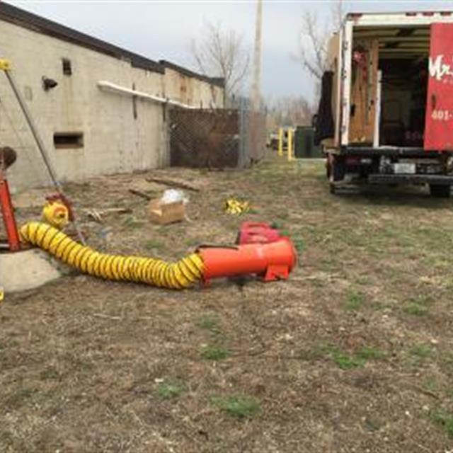 Working on a pump inside a chamber