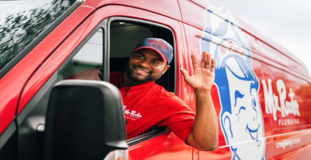 Mr. Rooter service professional arriving at a home.