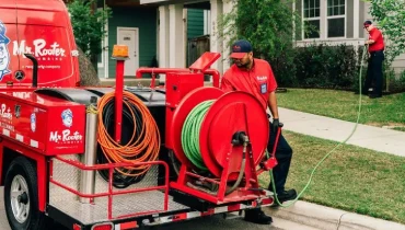 Mr. Rooter technicians getting ready to perform HydroScrub Jetting services